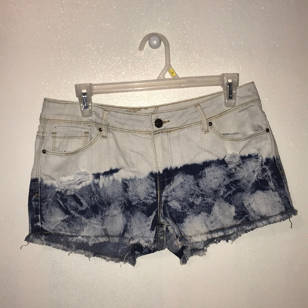 White and dip-dyed blue jean shorts